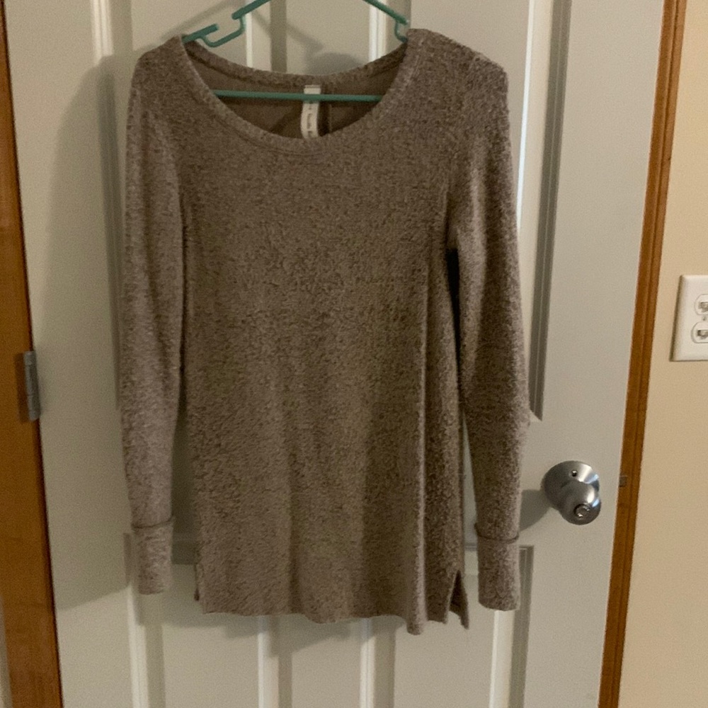 Light brown sweater with buttons down the back